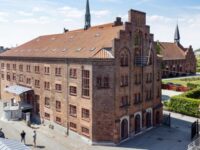 Den markante røde murstensejendom er kendt som Wiibroes gamle bryghus. Foto: EDC Erhverv Poul Erik Bech